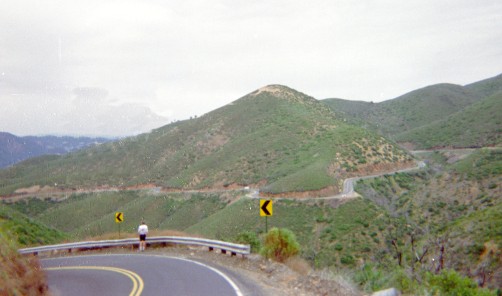 Old Priest Grade in foreground, Hwy 120 on hill in distance.
