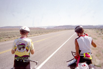 Rear shot of Frank and Adam stopped on the road