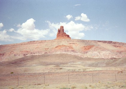 Monument Valley rock formation on top of a hill