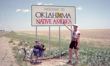 Alan, Bike and 'Welcome to Olkahoma' sign