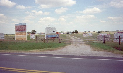 Dozens of signs along the side of the road