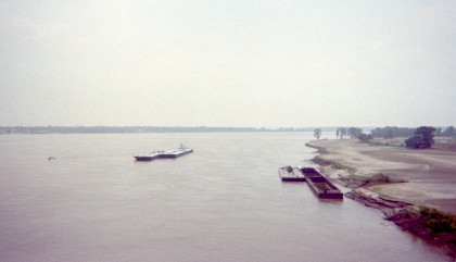 View from the bridge of the Mississippi River with barges