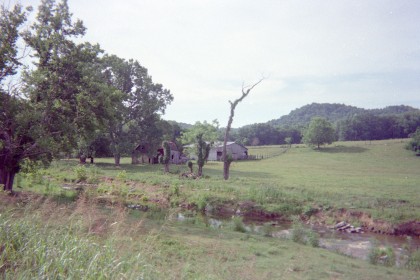 Country scene with farmhouse