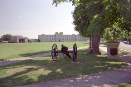 Buildings across grassy field with Civil War cannon in the
foreground, on the campus of the Virginia Military Institute