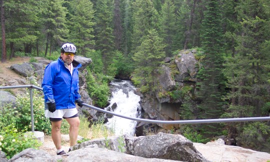 Don overlooking a small waterfall