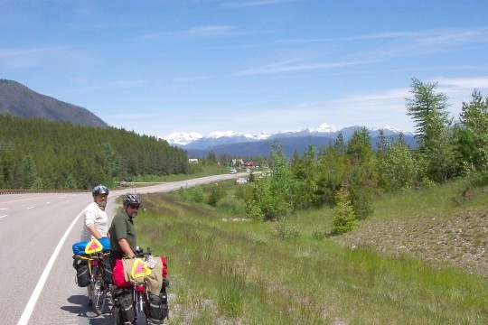 Don and Bill with snow-capped mountains in background