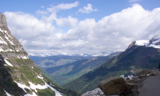 Vista down a valley with mountains in background