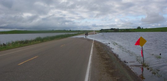 Water almost covers the road