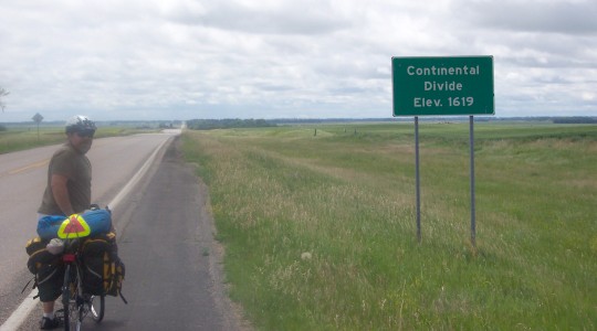 Don at sign 'Continental Divide, Elev. 1619'