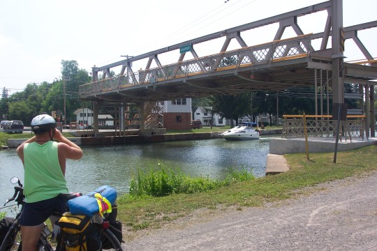 Don taking photo of boat in the canal