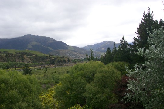 Looking out over green valley with hills in background
