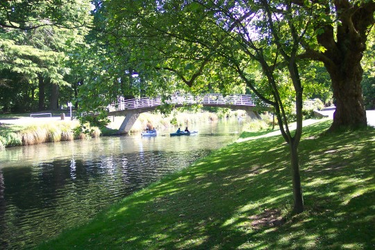 Stream with boat in botanic gardens