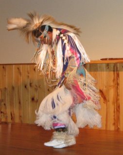 A dancer in full indian regalia