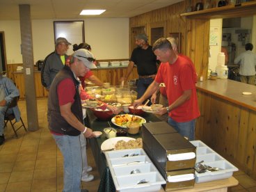 People going through the food line