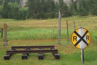 Verh short section of rails and ties with RR sign