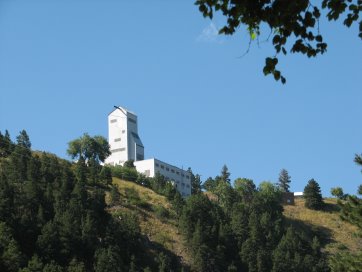 Building with tower up high on a hill