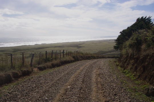 Road with sea in background