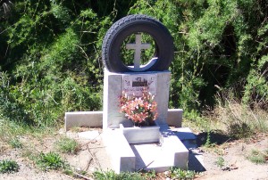 Interesting roadside shrine decorated with a tire