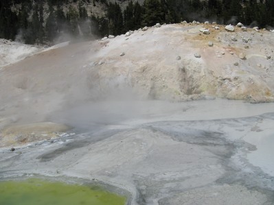Steam rising from a small boiling lake