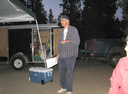 Vin speaking to the group in camp