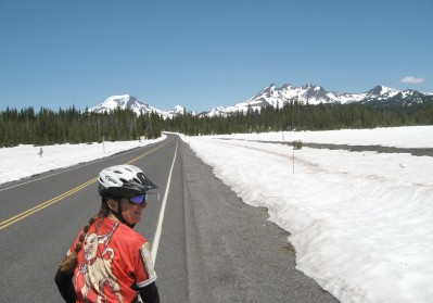 Sue riding on road with snow on both sides