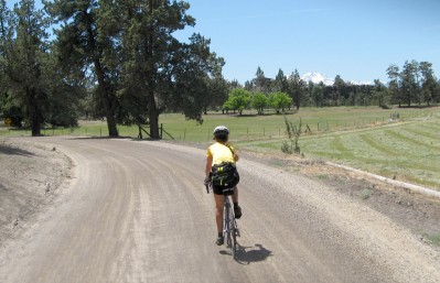 Sue riding on gravel road
