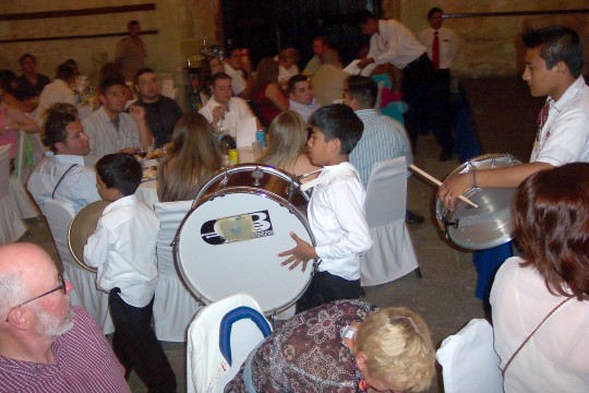 Band members marching through restaurant