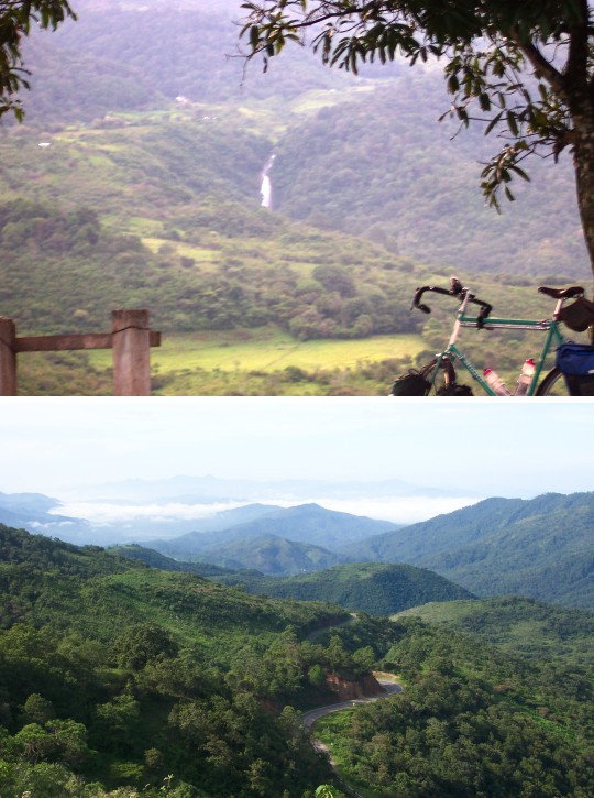 Bike with waterfall in background and mountains
