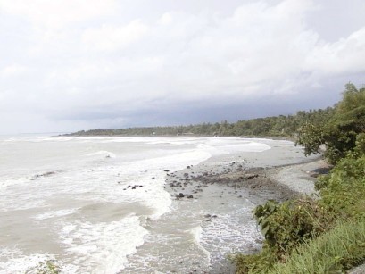 The seashore curving off into the distance