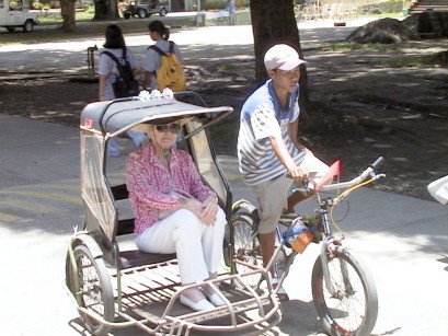 Mom taking a tricicad ride