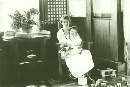 My grandmothers sitting with my infant mother on her lap