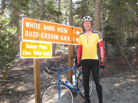 Me posing before sign at Kaiser Pass